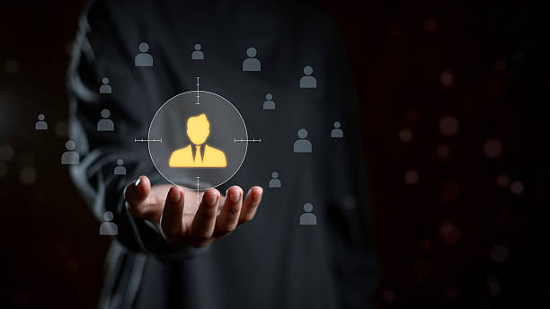 istock HR manager human resources concept with business hand selecting highlighted employee icon on digital network, symbolizing recruitment, leadership, workforce management, and organizational development. 2245789190
