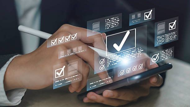 istock Quality control and approval concept with business hand using digital checklist on smartphone. Symbolizes validation, compliance, task completion, and data-driven decision making in tech. 2245789452