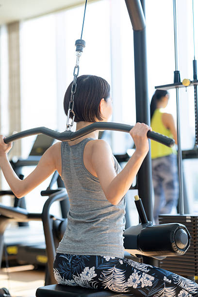 istock Middle-aged woman training at the gym 2245790208