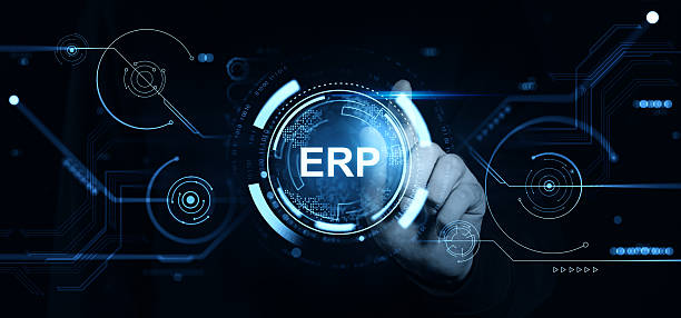 istock ERP system interface with futuristic HUD graphics and hand interaction in digital business management concept on dark technology background. 2245793574