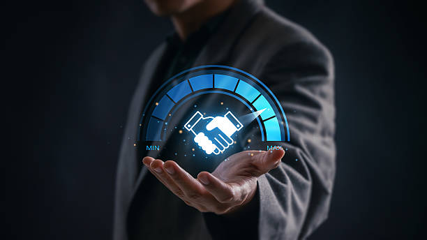 istock Trust and performance concept in business partnership showing handshake icon with full confidence meter, representing high level collaboration, commitment and mutual success in corporate relationships 2245795261