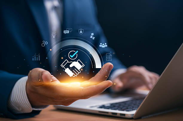 istock Business agreement and partnership concept with handshake icon, symbolizing trust, commitment and digital collaboration between professionals to ensure successful cooperation and contract approval 2245795307