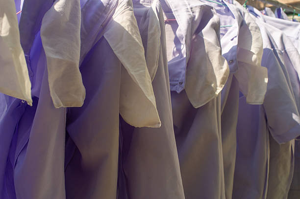 istock Medical uniform drying outdoors in natural daylight, representing hygiene, dedication, and hospital life 2245801293