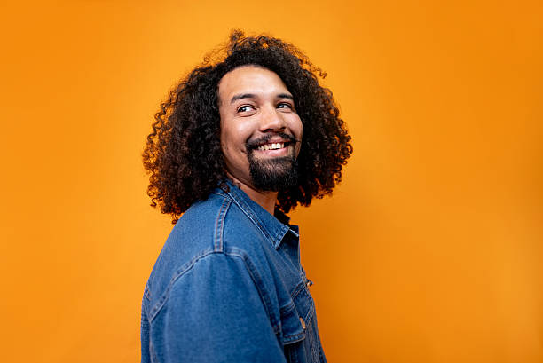 istock Young man contemplating looking away in a studio shot 2245804029