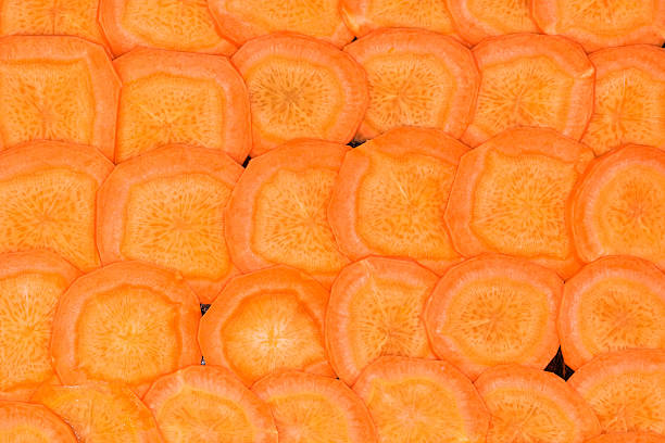 istock Carrot cut into circles and laid out in one layer 2245807493