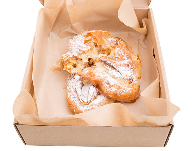 istock Heat apple puff cake in cardboard box. 2245807809