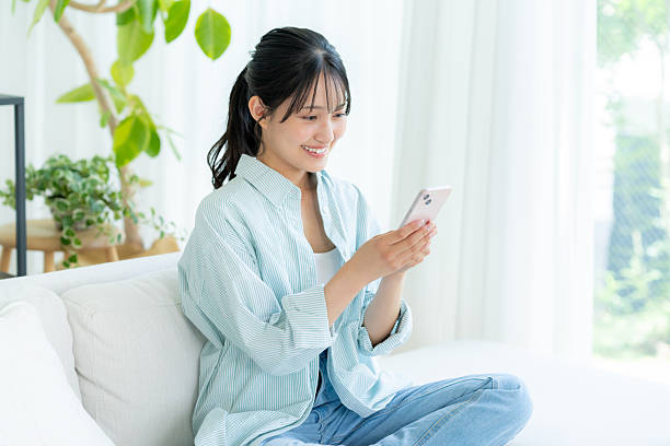 istock young woman calling on smartphone 2245807898