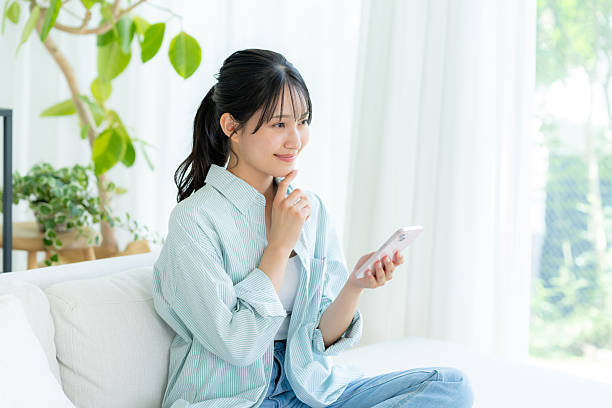istock young woman calling on smartphone 2245807930