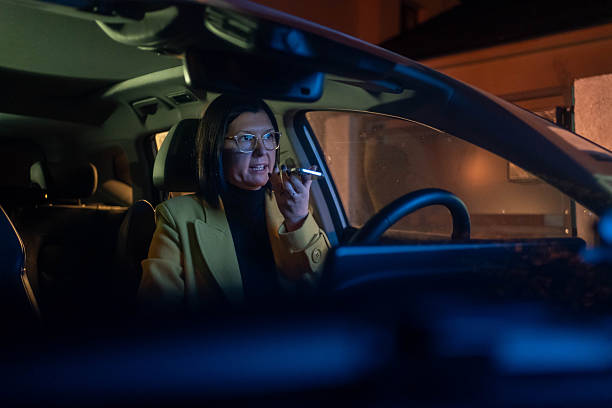 istock Beautiful female Driver talking on the Phone. 2245809243