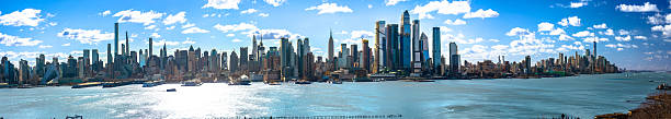 istock New York City epic skyline and Hudson river under bright sky pan 2245809875