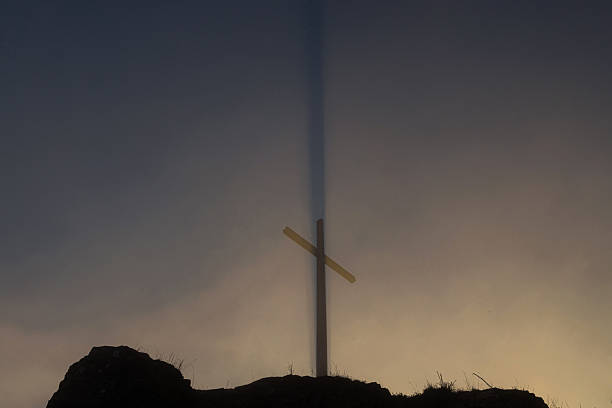a real cross in sun and fog