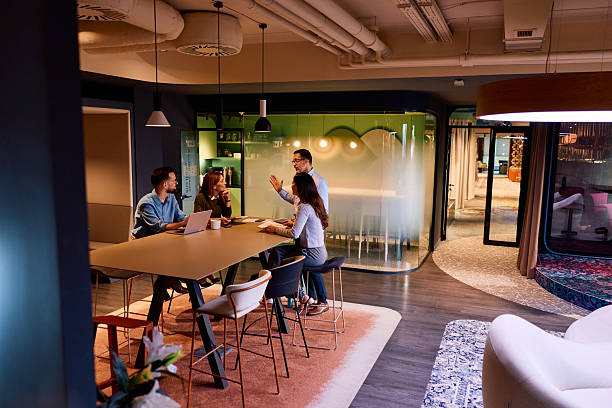 istock Business team collaborating in modern coworking office space 2245818396