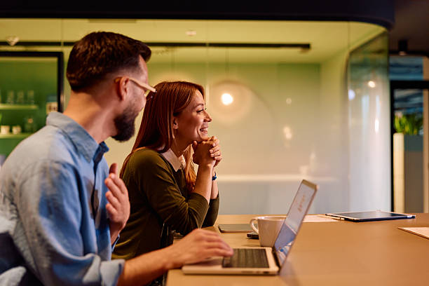istock Colleagues collaborating on business project at office meeting 2245818486
