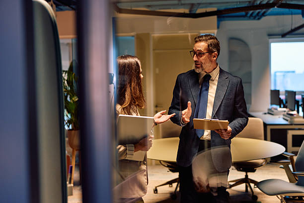 istock Business colleagues discussing project in office during meeting 2245818700