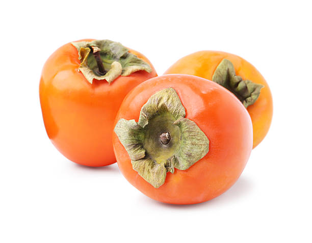 istock Delicious ripe juicy persimmons isolated on white 2245818972