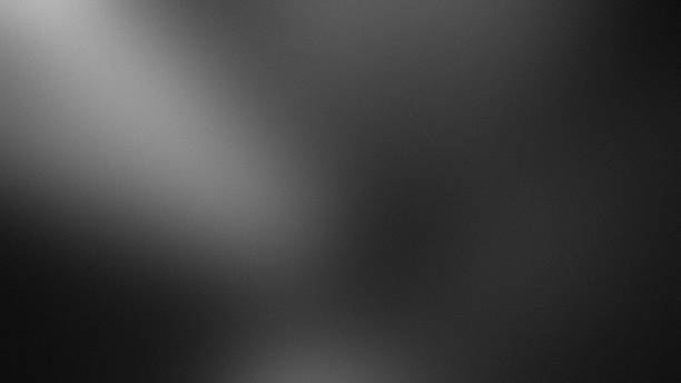 istock Noisy gradient gray blurred dark grainy abstract monochrome backdrop 2245821311