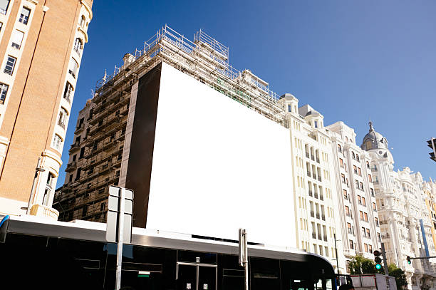 istock Blank billboard covering a building facade 2245827643