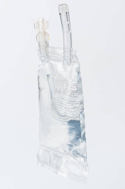 istock Transparent IV bag filled with sterile fluid against clean white background 2245828897