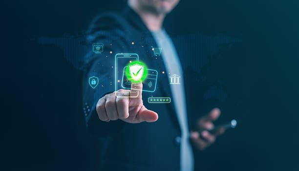 istock A businessman touches a glowing green shield on a virtual interface, representing online payment security, data protection, privacy, and cybersecurity in modern fintech systems. 2245833284