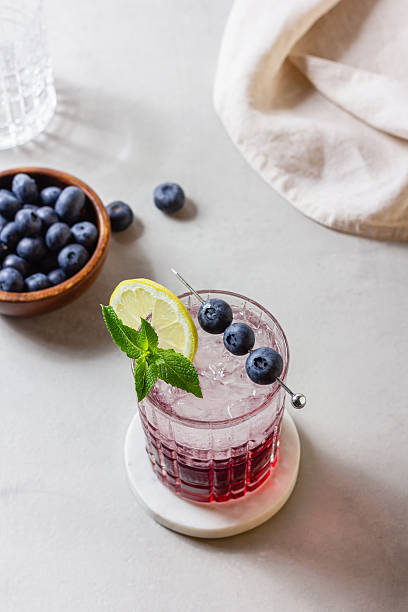 istock Summer fresh blueberry cocktail with ice, lemon and mint 2245834101