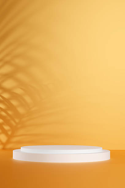 istock Minimal Yellow Background with White Podium and Tropical Shadow for Product Display and Cosmetic Presentation 2245835888