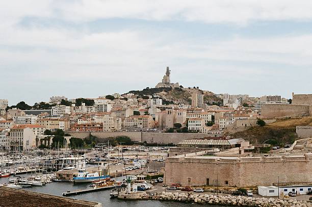A nostalgic analog journey through Marseille, France, capturing the timeless charm of the Vieux-Port, historic architecture, and Mediterranean light on classic film
