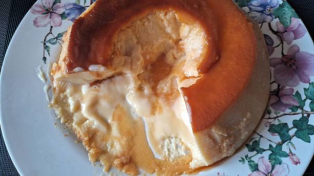 istock Delicious Caramel Flan Dessert on a Floral Plate 2245845614