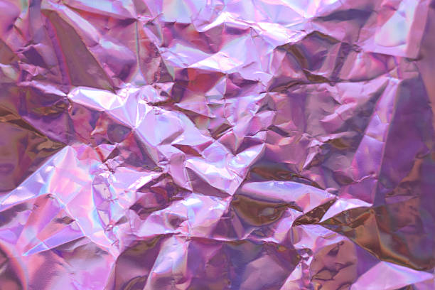 istock Crumpled pink and purple foil surface with iridescent metallic texture for vibrant background art 2245847036