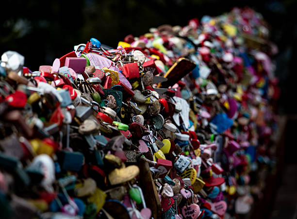 Hundreds of colorful love locks creating a vibrant wall on Namsan Tower railing