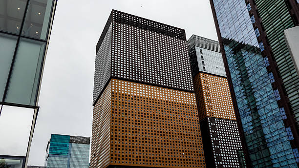 Seoul cityscape showcasing contemporary buildings with square pattern facades under a cloudy sky