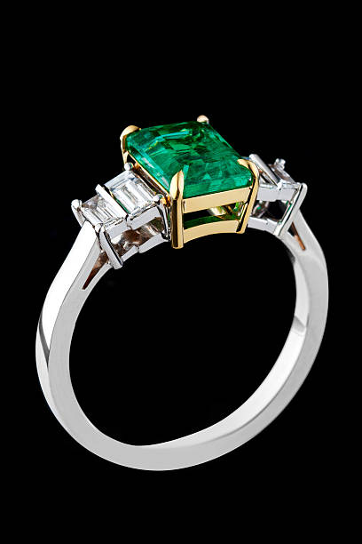 Hands showing diamond ring.