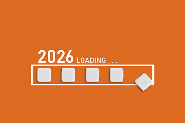 istock 2026 Loading text on Orange backdrop. Ideal for business planning, financial trends, and future economic concepts 2245857168