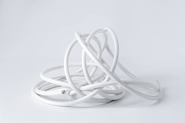 istock Tangled insulated electrical wire isolated on white 2245857399