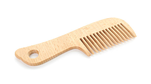 istock One wooden hair comb isolated on white 2245859242