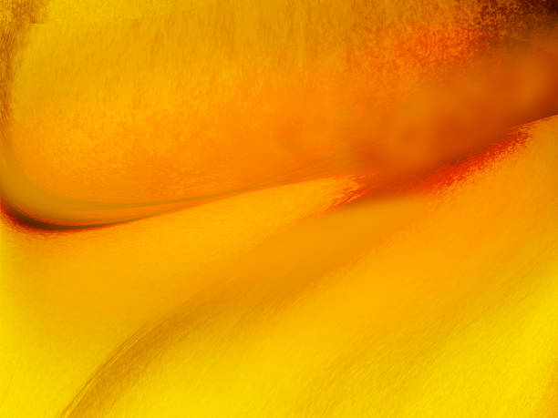 istock A striking yellow abstract composition featuring smooth, flowing curves and glossy textures. 2245863427