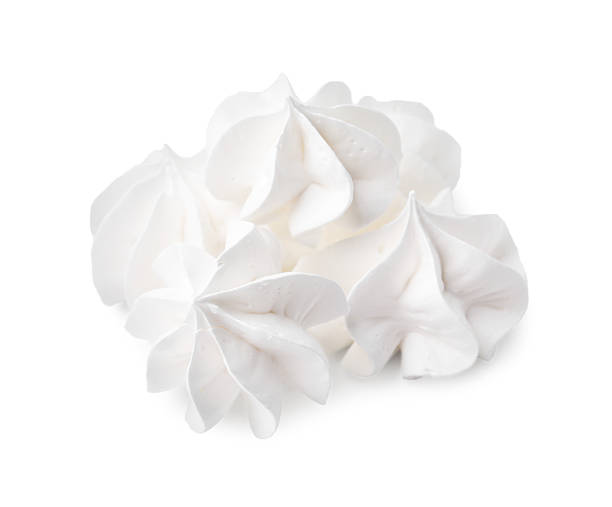istock Many delicious meringue cookies isolated on white 2245867526