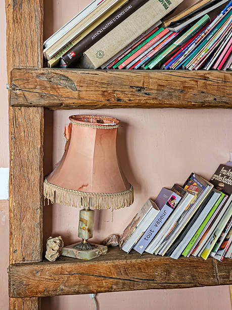 istock Bookshelf with pink lamp in Bar, 2245872220