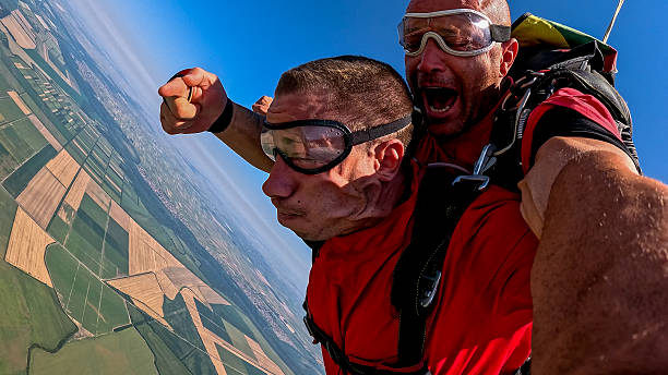 istock Two tandem skydivers capture adrenaline and panoramic views in a thrilling freefall selfie 2245872293