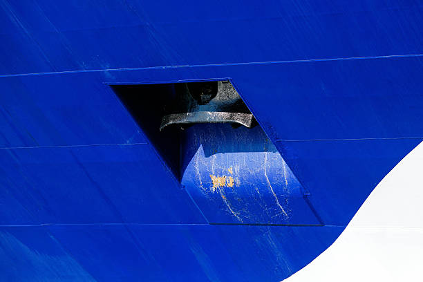istock Close-up of blue ship hull with anchor and rust details 2245877851