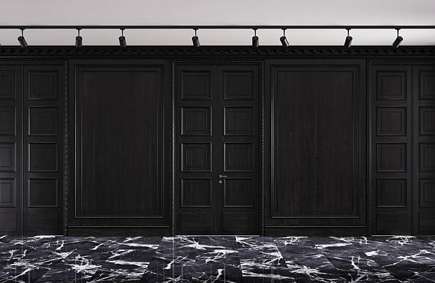 istock Luxury classic interior with double doors and boiserie on the walls. 2245885190