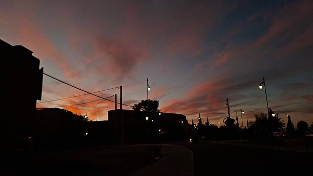istock Sunset Sky with Wispy Orange and Pink Clouds. 2245885762