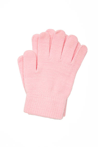 Warm woolen knitted gloves isolated on white background. Pink children gloves