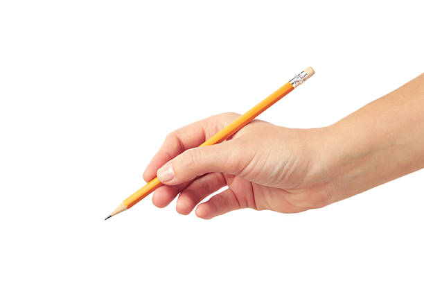 A woman's hand is holding a pencil ready to writing, isolated on white background. Top view