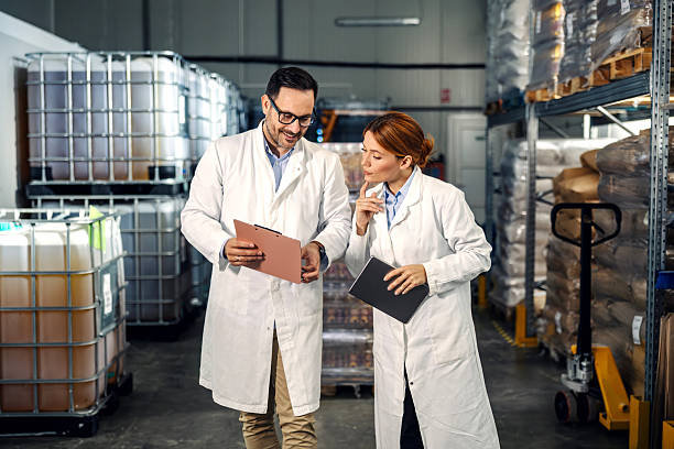 istock Scientists conducting quality control inspection in warehouse 2245891488