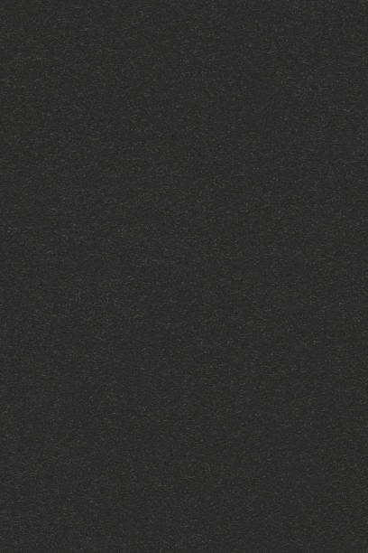 istock Natural black recycled kraft paper background texture, large detailed decorative vertical textured wallpaper macro closeup, blank empty horizontal pattern copy space 2245893637