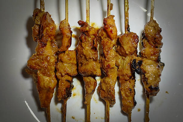 istock Delicious Indonesian Chicken Satay Skewers with Peanut Sauce. 2245902202