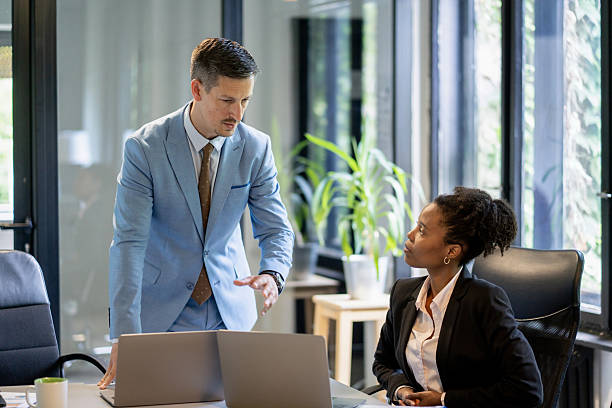 istock Business people discussing work in office meeting 2245907875
