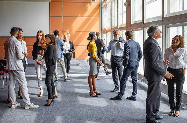 istock Diverse Business Executives Gathering for a Conference in Sunlit Room 2245909325