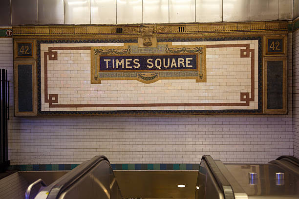 istock Times Square subway station with its tile mural at night in Midt 2245909561