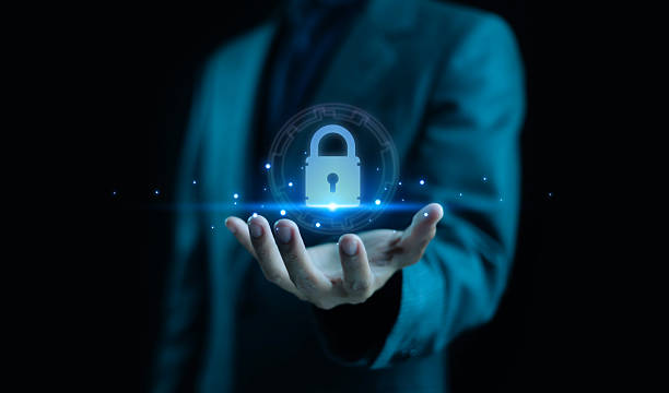 istock Businessman holding glowing padlock icon representing cybersecurity, data protection, privacy, and secure technology. Concept for digital security, network safety, and business information protection. 2245916859